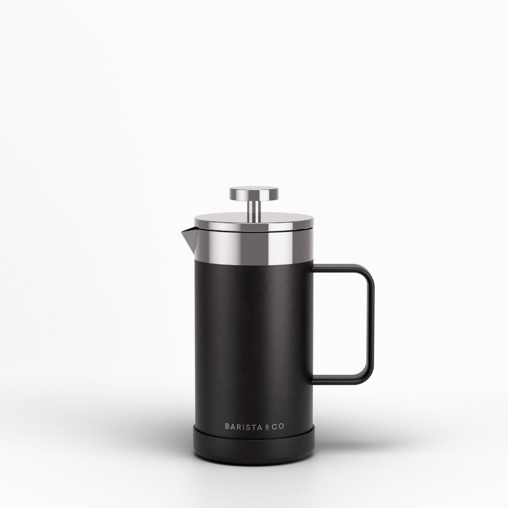 A matte black French press with stainless steel accents and a black handle, shown on a clean white background. The brand name 'BARISTA & CO' is printed in white near the base.