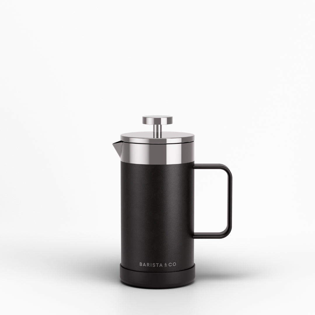 A matte black French press with stainless steel accents and a black handle, shown on a clean white background. The brand name 'BARISTA & CO' is printed in white near the base.
