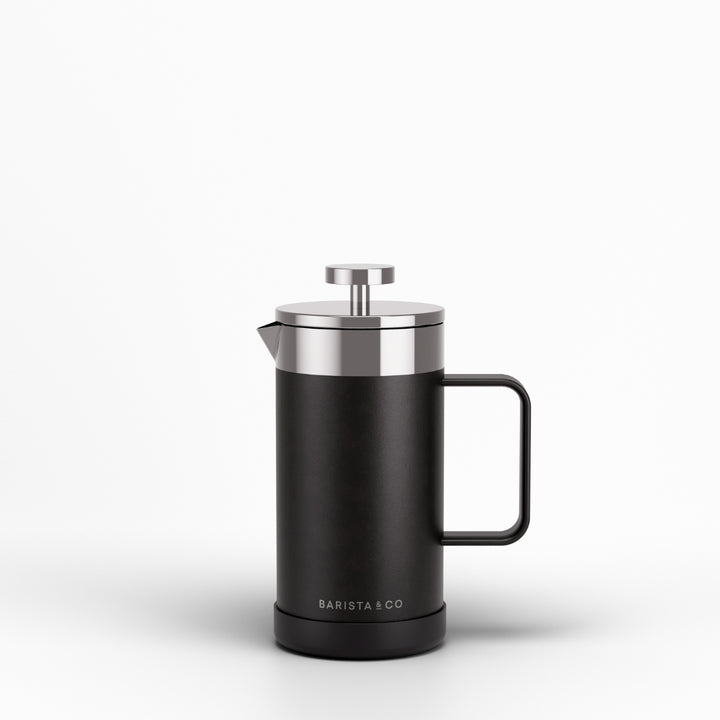A matte black French press with stainless steel accents and a black handle, shown on a clean white background. The brand name 'BARISTA & CO' is printed in white near the base.
