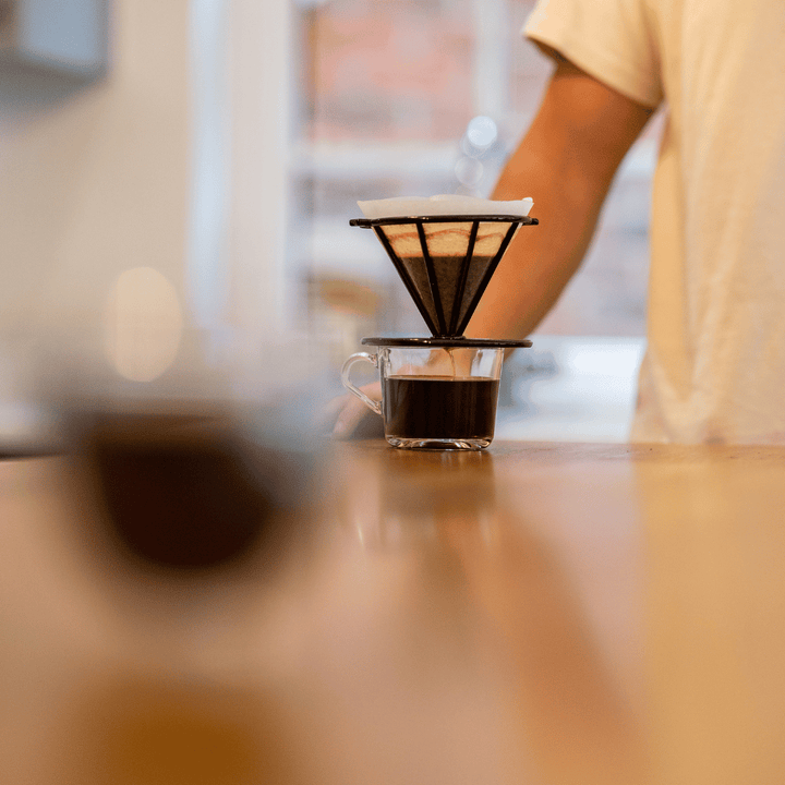 black filter pour over coffee